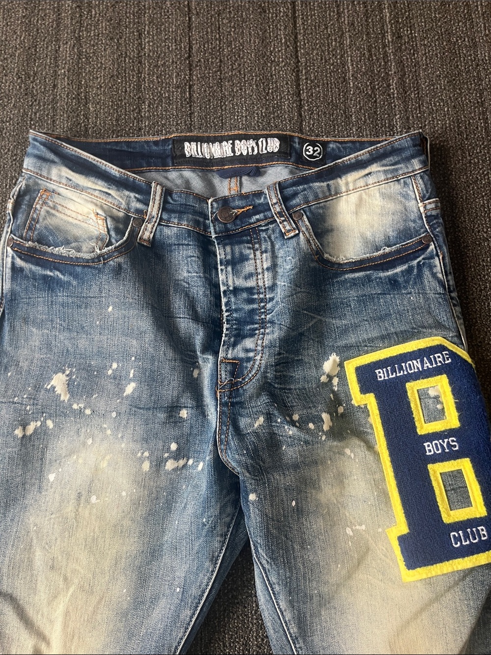 Billionaire Boys Club Faded Blue Distressed Jeans with Yellow Patch
